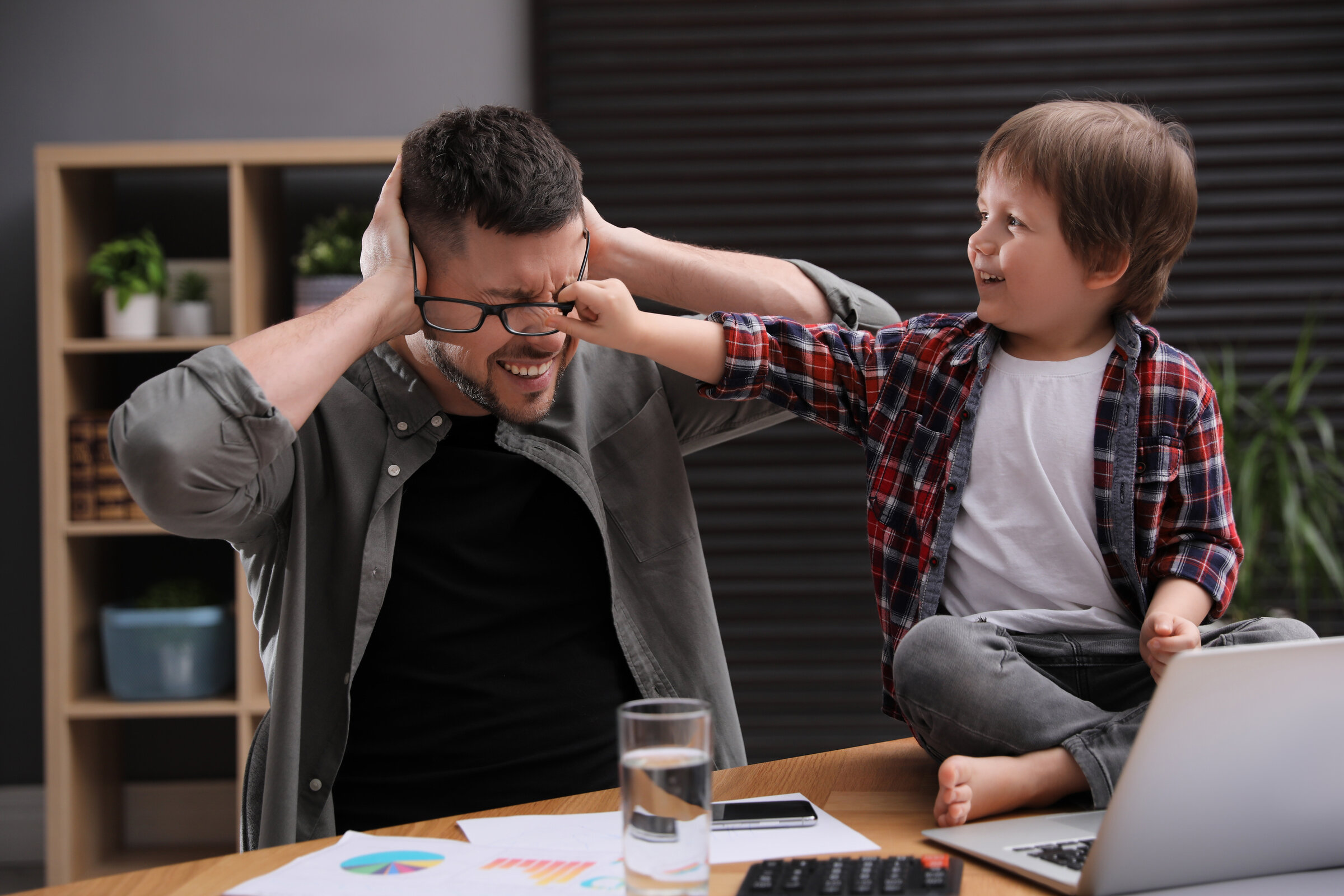 Dad Overwhelmed Trying to Work