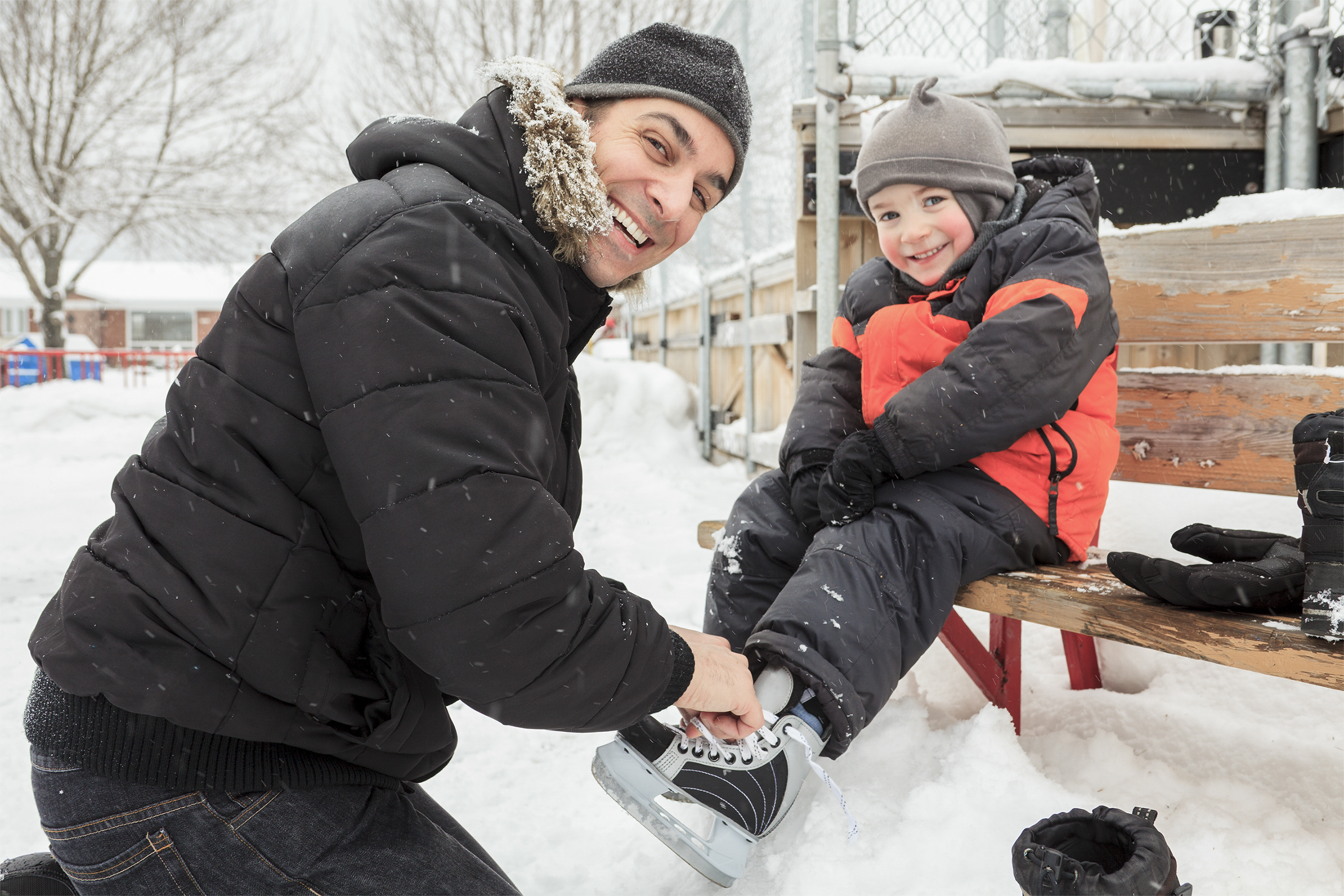dad about to skate with son