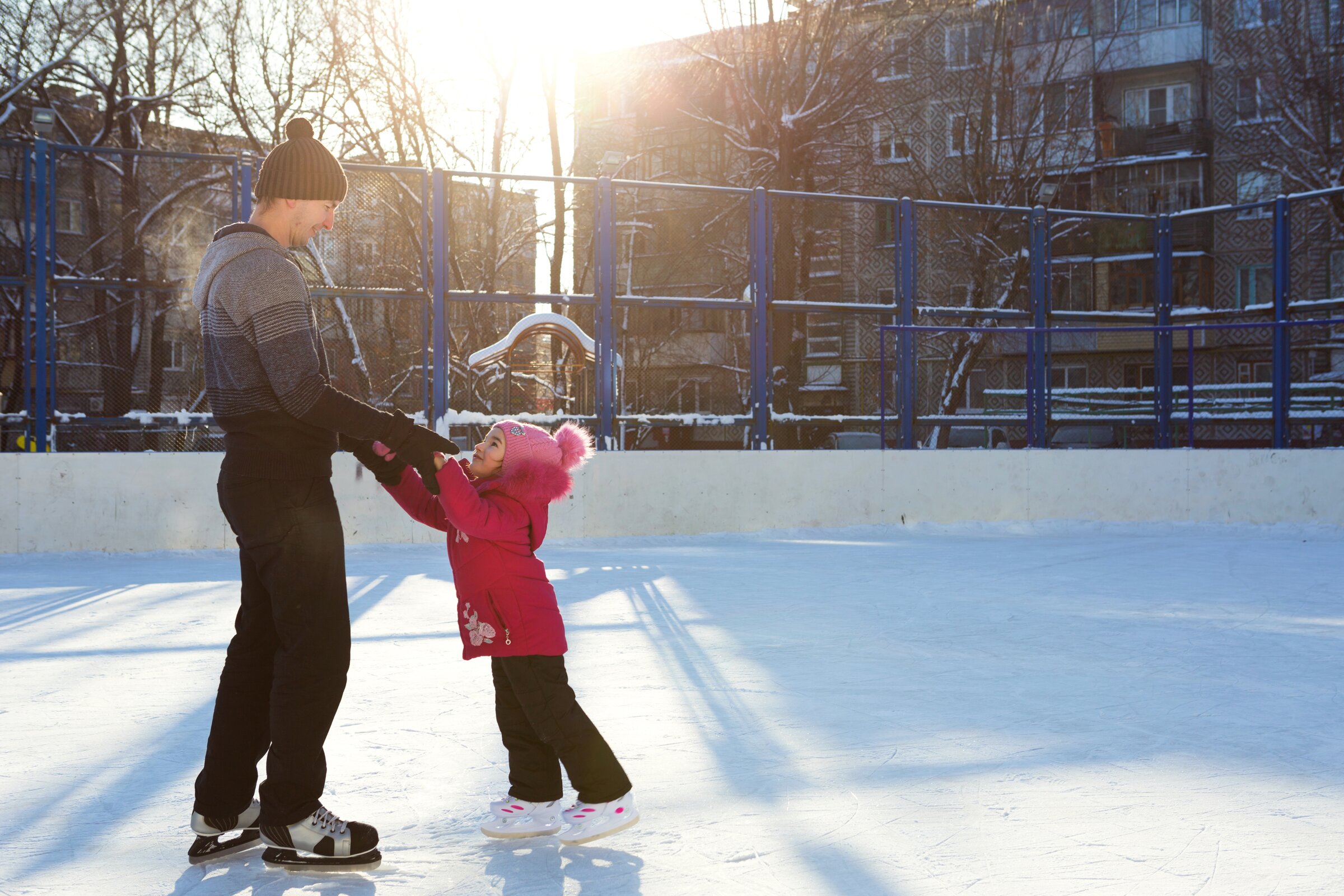 dad teaches daughter to skate
